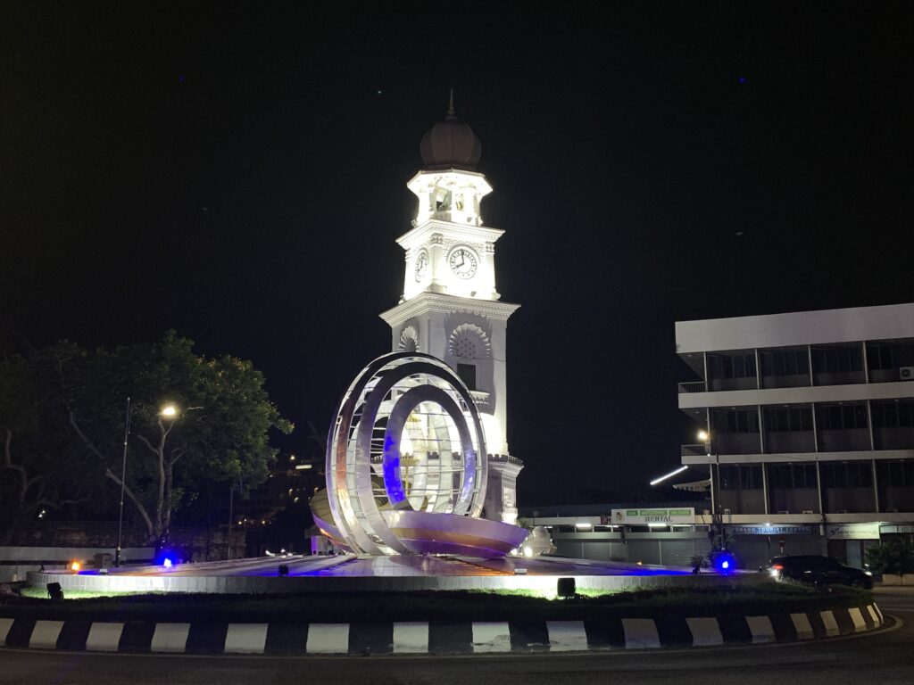 Queen Victoria Memorial Clock Tower Illuminated at Night